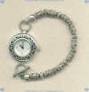 Watch with stainless steel watch head and hand and sterling silver beads. - Click for a larger picture