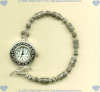 Sterling silver watch with sterling silver cylinder and wire beads and toggle end. - Click for a larger picture
