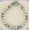 Rhodocrosite, freshwater pearls, Bali sterling silver beads and toggle Bracelet - Click for a larger picture