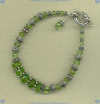 Faceted Peridot, round Peridot and Bali sterling silver beads Bracelet - Click for a larger picture