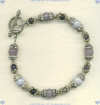 Sterling Silver Bracelet with Blue Lace Agate, Lavender Chalcedony, and Iolite Gem Stones. - Click for a larger picture