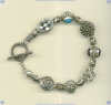 Ornate sterling silver bead toggle bracelet with semiprecious cabochon gemstones. - Click for a larger picture