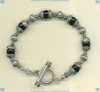 Handmade Sterling Silver Toggle Bracelet with Black Onyx Semiprecious Gemstones. - Click for a larger picture