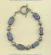 Blue chalcedony oval gemstone bracelet with handmade sterling silver toggle, beads, and filigre caps. - Click for a larger picture