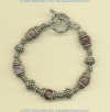 Russian charoite gemstone bracelet with handmade sterling silver beads and toggle. - Click for a larger picture