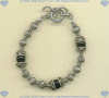 Toggle bracelet with handmade sterling silver beads and black onyx gemstones. - Click for a larger picture