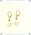White heart shaped freshwater pearl earrings with faceted garnet gemstone accent on gold fill leverback earwires. - Click for a larger picture