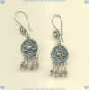 Sterling silver French hook earrings with faceted pink tourmaline gemstone dangles. - Click for a larger picture