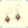 Earrings with faceted ruby jade rondels and handmade sterling silver beads and earwire. - Click for a larger picture
