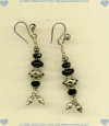 Sterling silver earrings with faceted and smooth rondel shaped black onyx semi-precious gemstones, French hook earwires made in Bali and handmade silver beads. - Click for a larger picture