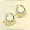Faceted citrine gemstones and handmade sterling silver hoop earrings with ruffle edge. - Click for a larger picture