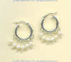 White freshwater pearls and handmade sterling silver hoop earrings with ruffle edge. - Click for a larger picture