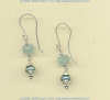Aquamarine gemstones and blue freshwater pearls on handmade sterling silver French hook earwires.				
 - Click for a larger picture