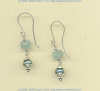 Aquamarine gemstones and blue freshwater pearls on handmade sterling silver French hook earwires.				
 - Click for a larger picture