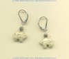 Fossil coral Zuni bear leverback earrings with handmade sterling silver coil bead accent. - Click for a larger picture