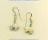 Fossil coral Zuni bear 14K gold fill leverback earrings with turquoise heishi gemstone accents.
- Click for a larger picture