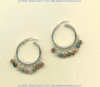 One inch diameter sterling silver hoops with faceted fancy jasper gemstones.				
 - Click for a larger picture