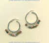 One inch diameter sterling silver hoops with faceted fancy jasper gemstones.				
 - Click for a larger picture