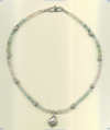 Aquamarine and Hill Tribe Silver Tube and Puffed Scallop Bead Necklace. - Click for a larger picture