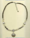 Violet oyster shell heishi, biwa pearls, and Thai Hill Tribe silver necklace with extender chain.
- Click for a larger picture