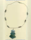 Black lip oyster shell pendant with gray abalone nuggets, sterling silver chain and clasp, and Hill Tribe silver (99.9%) bead accent. - Click for a larger picture