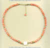 Pink coral, facted square mother of pearl, and 14K gold fill bead necklace with 2 inch extenter chain.	 - Click for a larger picture