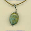 Peruvian turquoise pendant with handmade sterling silver findings.
- Click for a larger picture