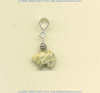 Fossil coral Zuni bear split bail pendant with handmade sterling silver coil bead accent.
- Click for a larger picture