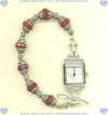 Watch with faceted ruby jade rondels and handmade sterling silver beads and toggle. - Click for a larger picture