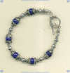 Bracelet with Lapis Lazuli Semi-precious Gemstones and Hand Made Sterling Silver. - Click for a larger picture