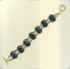 Bracelet with lapis lazuli double holed gemstone and 14K/gold fill beads and toggle. - Click for a larger picture