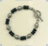 Black onyx and handmade sterling silver toggle bracelet. - Click for a larger picture