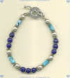 Bamboo shaped blue turquoise and lapis lazuli gemstone and handmade sterling silver bead and toggle bracelet. - Click for a larger picture